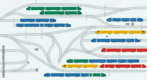 Train tracks and colorful trains at a station.