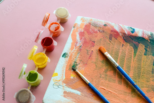 Paint and brush. Abstract Oil Painting with Vibrant Orange and Red Brushstrokes on Textured Canvas – Modern Artistic Background for Creative Design