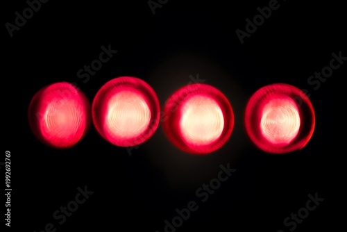 light leak overlay effect with scratch dust and red light leaks,retro noisy film texture light leak flare on black background,grunge texture with light leaks