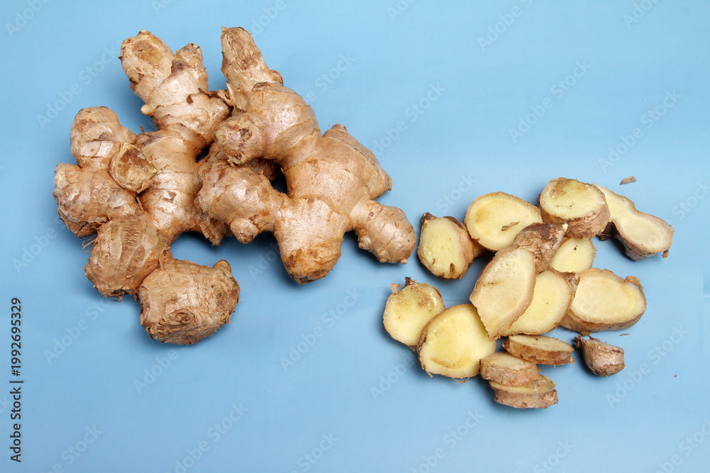 Fototapeta premium ginger root on a wooden background