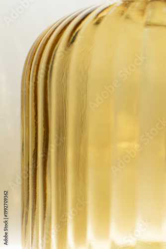 Abstract curved amber glass surface with vertical lines minimal design luxury texture background for wall art poster mockup branding template modern aesthetic decorative composition