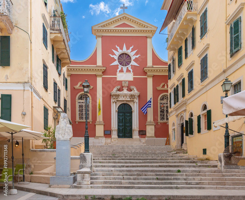 Church facade with stone steps in Corfu Old Town, Greece