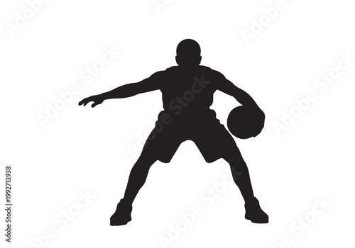 Black silhouette of a basketball player dribbling the ball in a low defensive stance