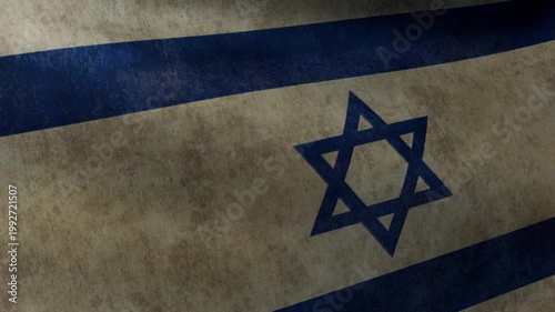 Close-up of the fluttering flag of Israel with well-worn fabric texture