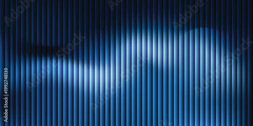 Abstract vertical lines in shades of blue with a bright focused light spot