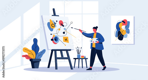 Woman artist in a blue coat stands before a large easel and paints an abstract artwork in a bright and modern art studio.