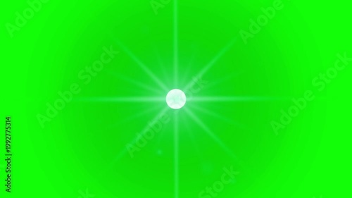 Bright lens flare animation on green screen with glowing star burst and light rays, professional chroma key overlay visual effect for video editing and motion graphics production in ultra HD 4K