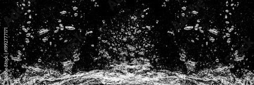 Air bubbles in water on a black background (isolate)