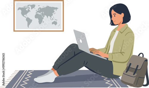 Woman sitting on rug with laptop and backpack studying map