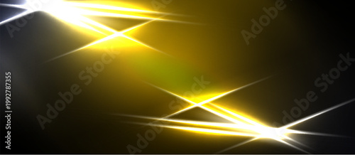 Bright yellow light streaks across dark background. Geometric shapes intersect, creating dynamic visual effect. Intense glow dominates composition.