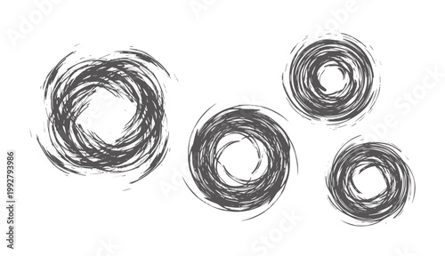 Four dark grey abstract circular brush stroke white