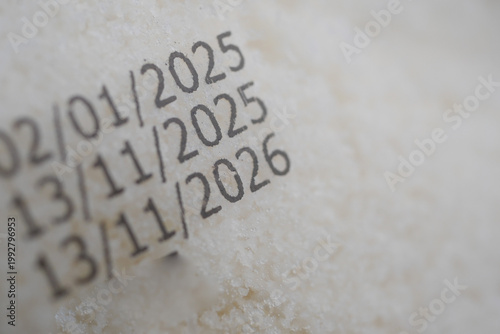 Bilde på lerret Dates printed on a surface of white material