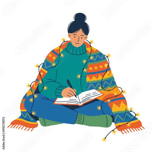 Person writing in journal wrapped in blanket with fairy lights