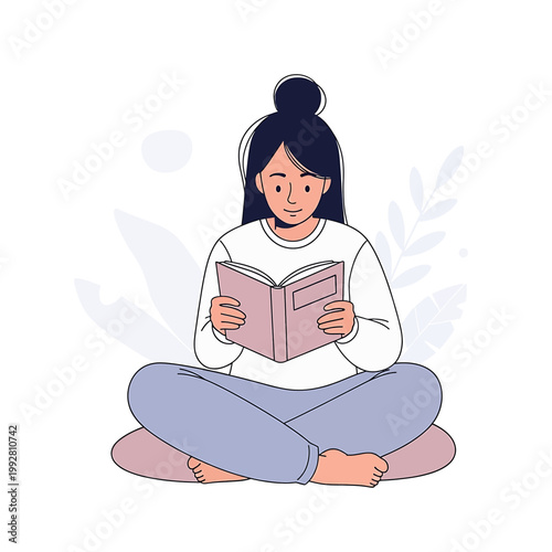 Woman reading book sitting crosslegged.