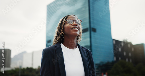 Thinking, real estate and black woman in city, smile and vision for investment opportunity. Low angle, employee or African person in street, insight of urban location or property evaluation or choice