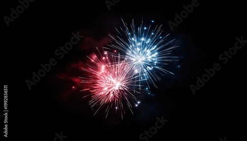Red and blue fireworks explosion isolated on black background 4th of July