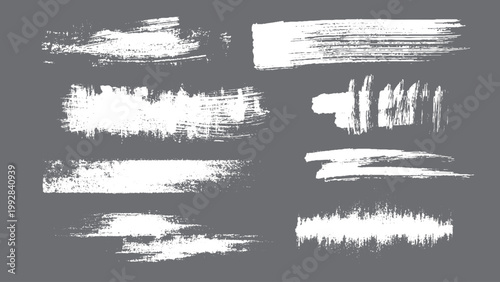 Black hand drawn brush stroke stripes with bold smears and textured grunge paint lines in calligraphy style