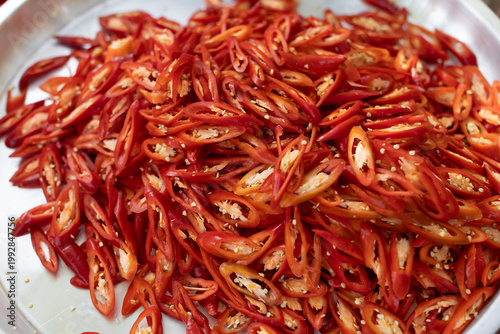 Sliced ​​red chili peppers, close-up photograph.