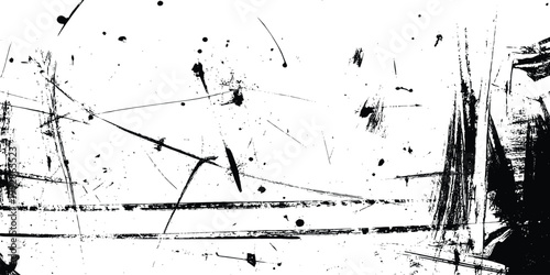 Abstract black ink splatters and scratches on white background grunge texture overlay