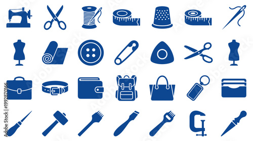 Collection of blue sewing and tailoring tools and accessories on a white background