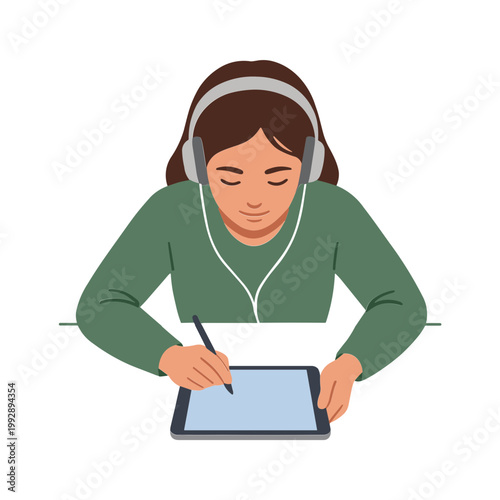 A woman wearing headphones uses a stylus on a tablet while sitting.