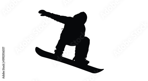 Silhouette of a snowboarder performing a trick in mid air