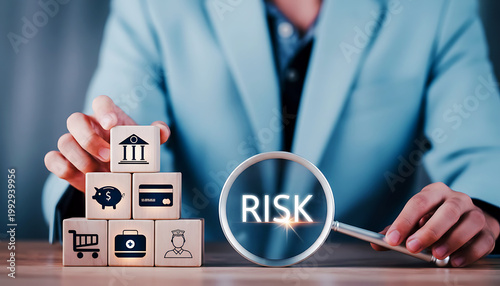 Businessman analyzing risk with wooden blocks and financial strategy concept.