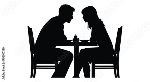 Silhouette of a couple enjoying a romantic dinner together