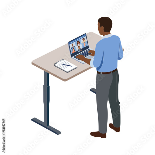 Man working standing desk laptop meeting coworkers