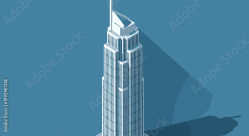 Tall modern skyscraper building with a sharp pinnacle standing under a clear blue sky with a long shadow cast on the ground.