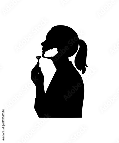 Person exploring gender identity shaving facial hair