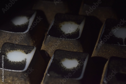 Tableau sur toile Macro of extremely dirty and worn-out black mechanical keyboard keycaps with heavy dust buildup