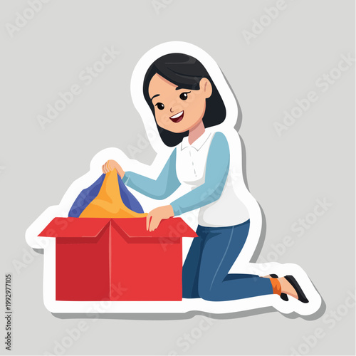 Woman unpacking a red box with clothes