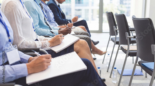 Schilderij op canvas Business professionals attending a corporate conference or seminar