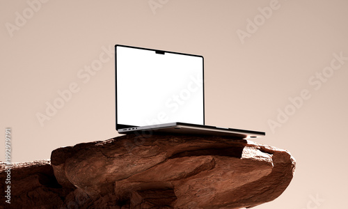 Modern laptop mockup on a rock with a blank screen in realistic 3D rendering, ideal for showcasing websites, apps, or UI designs. Clean minimalist scene with a natural and tech contrast