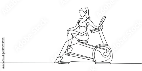 Woman exercising on stationary bicycle equipment exercise fitness stationary bike cycling