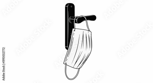 Medical mask hangs from a dark door handle on a white background
