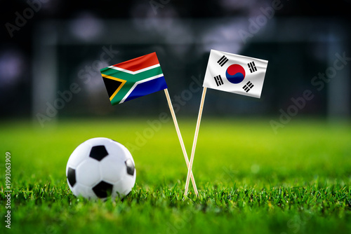 South Africa vs South Korea, national flags before world championship Group A group stage match, football on green pitch with goal in the background, Guadalupe, Mexico, June 24, 2026