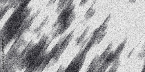 Abstract monochrome background featuring diagonal streaks of dark grey and black against a speckled white and grey textured surface, evoking a sense of motion and energy