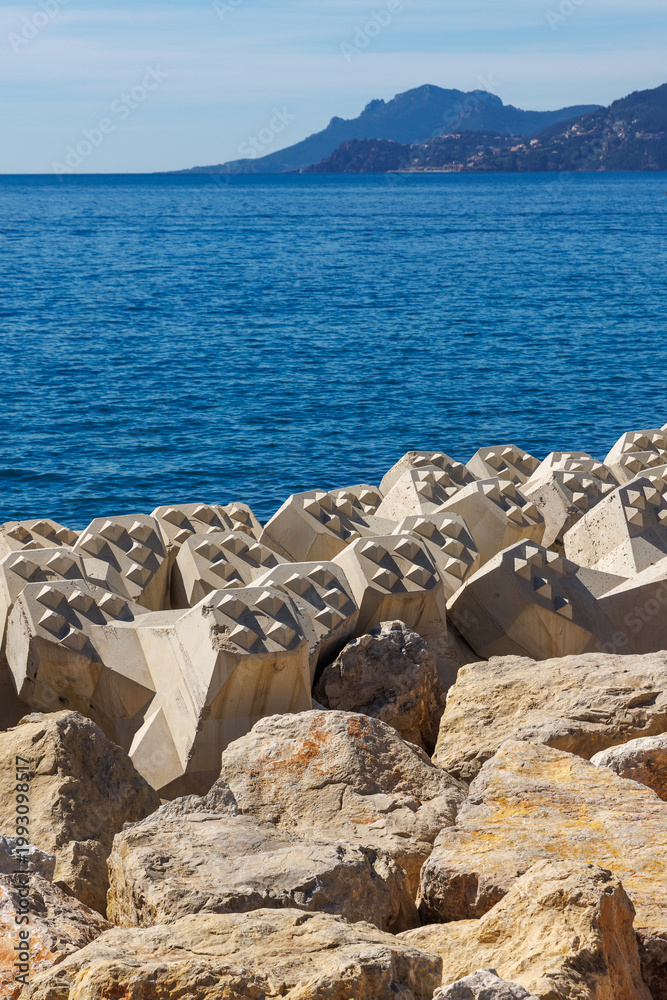 Fototapeta premium Concrete breakwater blocks on Cannes coastline