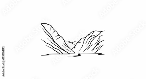 A lone boat navigates a tranquil body of water between majestic, jagged mountains