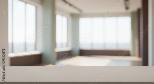 Modern office interior featuring a clean wooden table surface for product display in a bright corporate workspace with soft natural window lighting and professional style