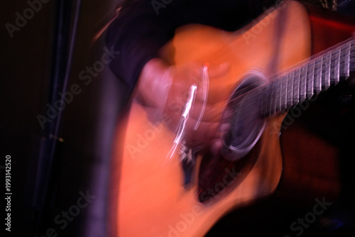 Guitar playing on stage live concert instrument detail