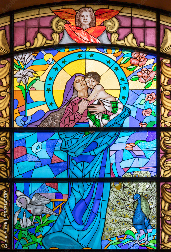 Naklejka premium Salerno - The Madonna in stained glass of church Chiesa della Santissima Annunziata designed by Giuseppe Turri and made by Antonio Perotti