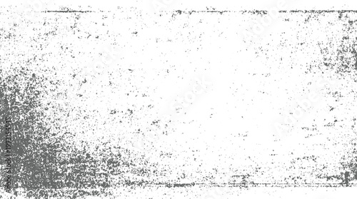 Textured grey speckles and smudges on a white background creating a distressed grunge effect abstract
