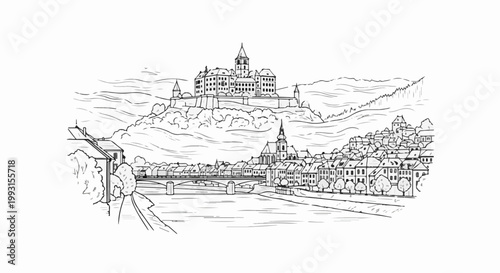 Historic European riverside town with a castle on a hill