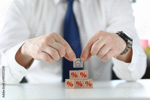 Property rates and real estate interest, interest rates, inflation, mortgage loans, tax increases. Increasing interest rates concept.