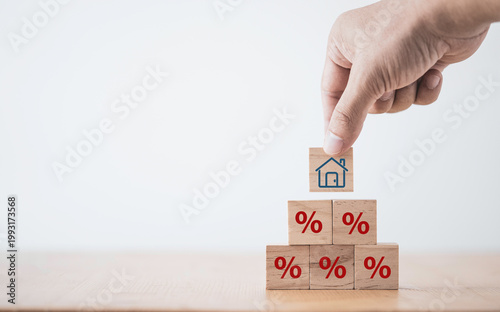 Property rates and real estate interest, interest rates, inflation, mortgage loans, tax increases. Increasing interest rates concept.