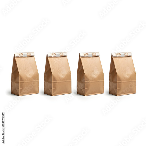 Four brown paper bags filled with various items neatly arranged in a row.