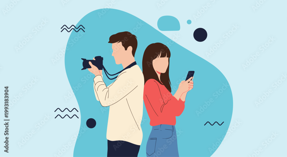 Obraz premium Creative man holding a professional camera and a woman using a smartphone, standing back to back against a blue background.